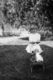 Louise Bomlay with carriage and dolls