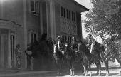 Four riders outside a mansion - De Land, Florida