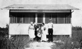 Group posed before beach cottage - Estero Island, Florida.