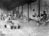Florida National Guard Signal Corps trainees spooling wire