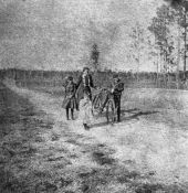 Children with bicycle on a road