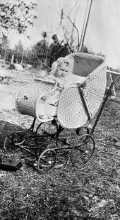 Fulton W. Boney in a baby carriage.