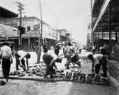 Putting down brick pavement - Tampa, Florida.