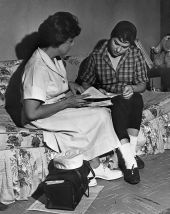 Young Cuban woman visited at home by Spanish-speaking nurse - Miami, Florida.