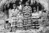 Two Seminole men with boy and girl - Florida