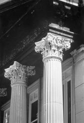 Detail of capitol showing faces of famous authors
