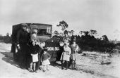 Children and driver in front of school bus - Franklin County, Florida