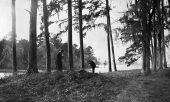 Genevieve and Edward Beadel at lakeside with cameras - Lake Iamonia, Florida