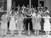 Faculty watermelon party on the front steps of Dixieland Elementary School
