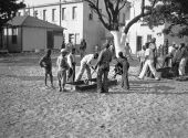 Boys playing box hockey - Miami, Florida.