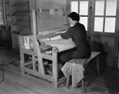 Weaving on a large loom at the WPA's Camp Roosevelt - Ocala, Florida.