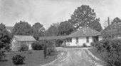 Luna Plantation dining room and house connected by covered walkway