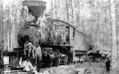 Crew posed at engine number 2 with its log train