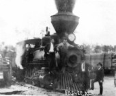 Escambia Railway engine number 4 taking on wood at Foshee, Alabama