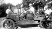 View of two men and an automobile - Rockledge, Florida.