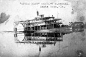 The Charles E. Cessna at Pensacola dock loading mail and supplies.
