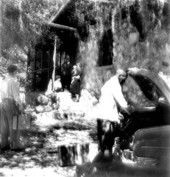 Couple and children checking into a rental cottage - Rainbow Springs, Florida