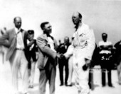 Sir Henry Segrave shaking hands with Sig Haugdahl - Daytona Beach, Florida.