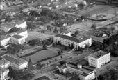 Aerial view looking southeast showing the Centinnial Field and coal and gas plant.