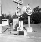 Old Spanish Trail marker on the southeast corner of Monroe and Brevard streets.