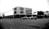 Commercial buildings on the corner of Monroe and College.
