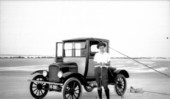 Man standing next to car - Jacksonville, Florida