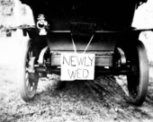 Newly wed sign on back of car