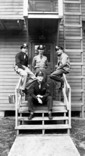 Pilots on the steps of the barracks
