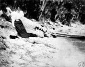 Couple at the waterfront with an alligator - Rockledge, Florida