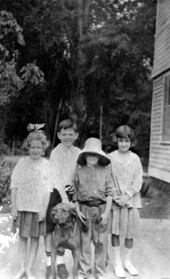 Children posing with Dan the dog - Tallahassee, Florida.