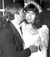 Governor D. Robert Graham kissing his daughter Gwen just before her wedding