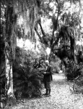 Founder Arthur McKee stands at McKee Jungle Gardens - Vero Beach, Florida.