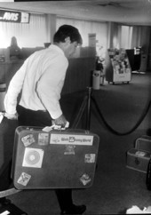 State Senator Bob Graham during workday as a bellboy - Orlando, Florida.
