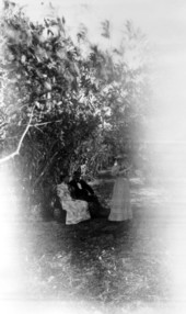 People relaxing in Orange City, 1890.