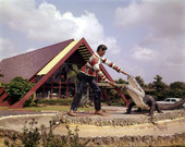 View showing sculpture in front of the Okalee Indian Village and Crafts Center