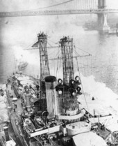 U.S.S. Florida (BB-30) passing under the Brooklyn Bridge - New York, New York
