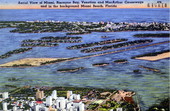 Aerial view of Miami, Biscayne Bay, Venetian and MacArthur causeways and in the background Miami Beach - Florida.