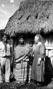 Deaconess Bedell and some Seminole Indians, including Ingram Billie at the left