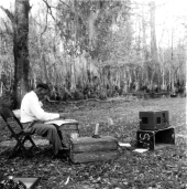 Seminole Indian Josie Billie sitting in a chair looking at a Wheel of Life