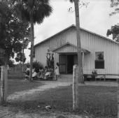 Seminole girls sitting in front of Baptist Church