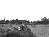 The Parmenter family in their strawberry field at Orange Park.