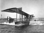 Curtiss H-12 taxiing in the water at NAS Pensacola.
