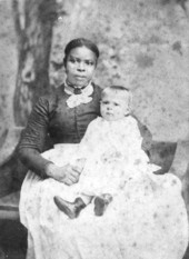 Former slave "Aunt Jane" with one of the J. D. Palmer children