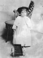 Leslie Washington Weedon, Jr. posed with cart.
