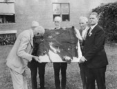 Return of a Confederate army unit battle-flag, at a United Confederate Veterans' reunion in Marianna, Florida.