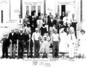 Lion's Club members pose with a group of blind persons with new white canes - De Soto County, Florida