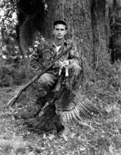 Hunter and turkey kill