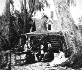 Stowe family in front of their home.