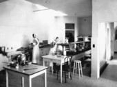 Nurses in hospital kitchen.