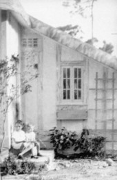 Mary and Toby Muir on the steps of Marjory Stoneman Douglas home.